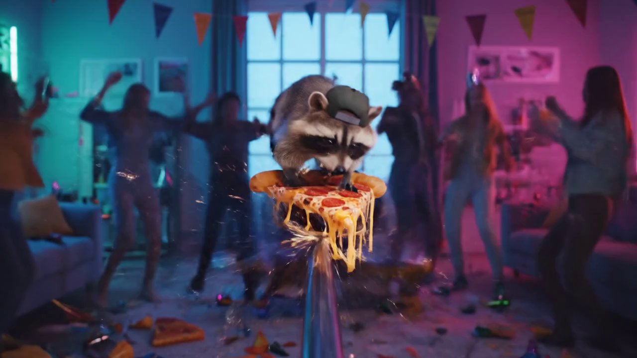 Neon-lit living room party chaos. A mischievous ra... - Veo 3 AI video prompt thumbnail